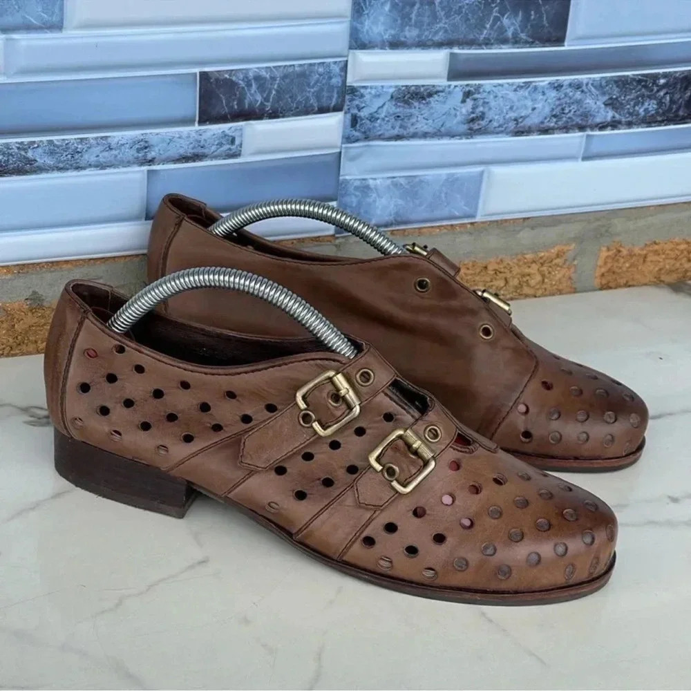 Antelope Brown Peforated Two Buckle Leather
Shoes 39/8.5
